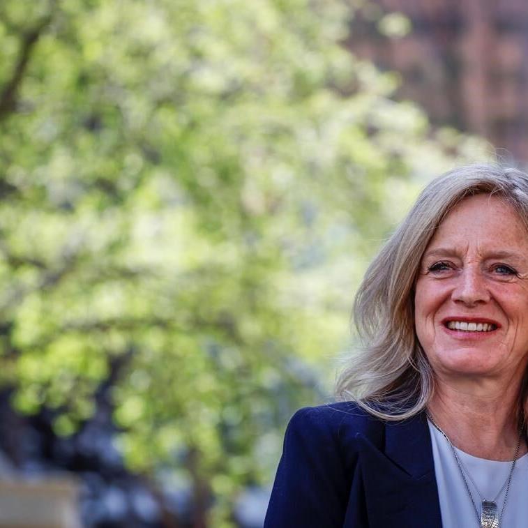 Protesters of Alberta premier's private health comments storm stage at news event